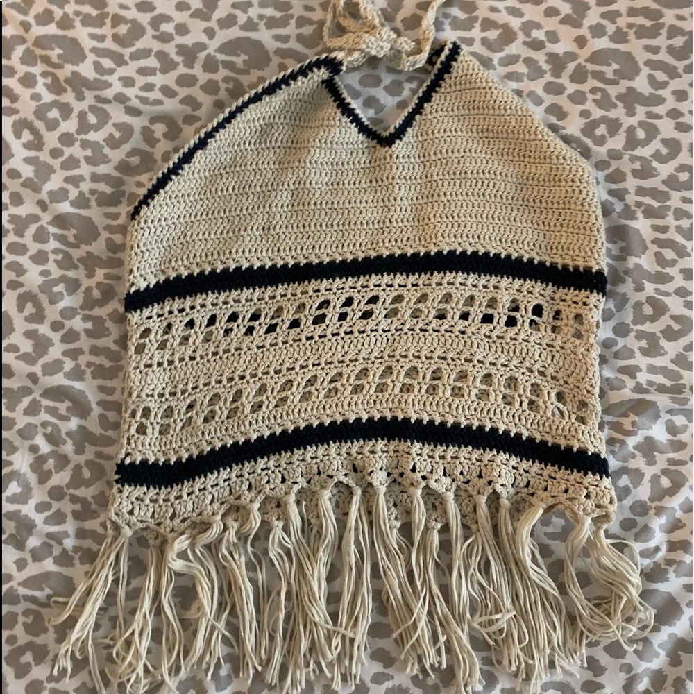 a cute white and black crop top, size medium and worn a few times